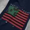 Cotton Wreath Rugby-shirt met krans en pan-Afrikaanse vlag, grijs/marineblauw