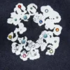 Loszittende denimbroek met studs en Cotton Wreath-motief, selvedge