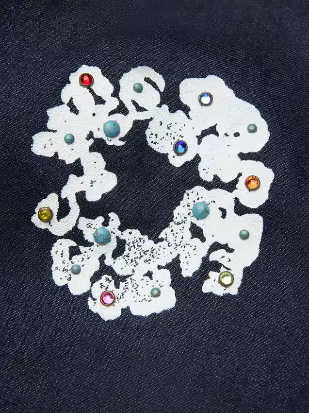 Loszittende denimbroek met studs en Cotton Wreath-motief, selvedge